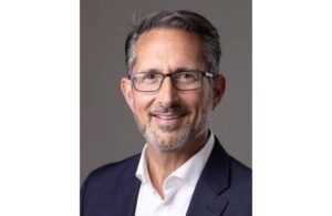 Portrait photo of Teva Pharmaceuticals Global R&D Chief Medical Officer CMO Eric A. Hughes